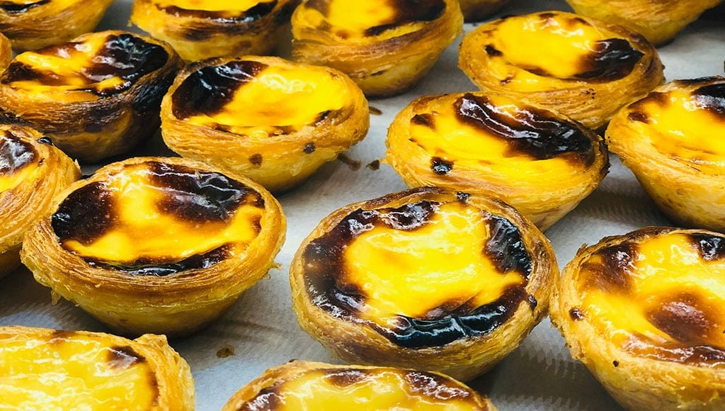 Pastel de nata (singular); past&eacute;is de nata (plural) &ndash; Photo: ALICE BUTENKO/UNSPLASH